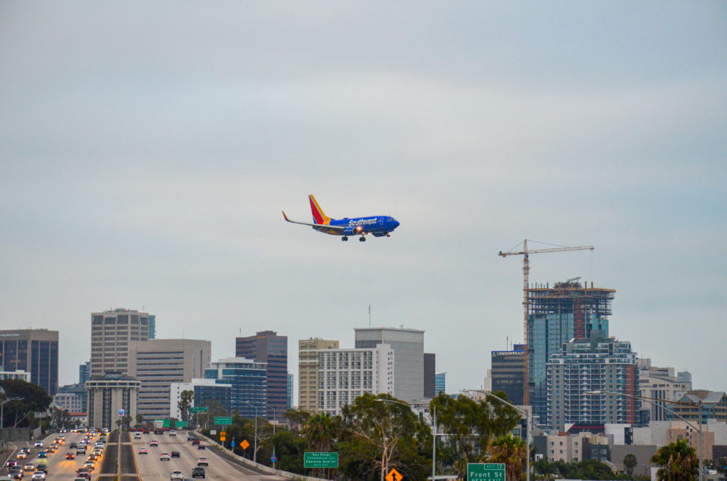 Plane flying over downtown san diego
