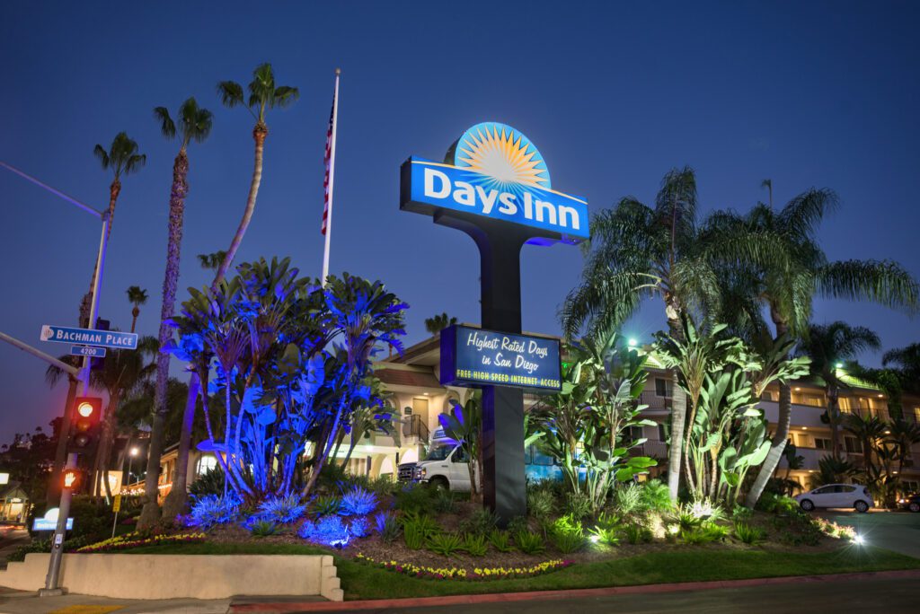 the hotel sign at night
