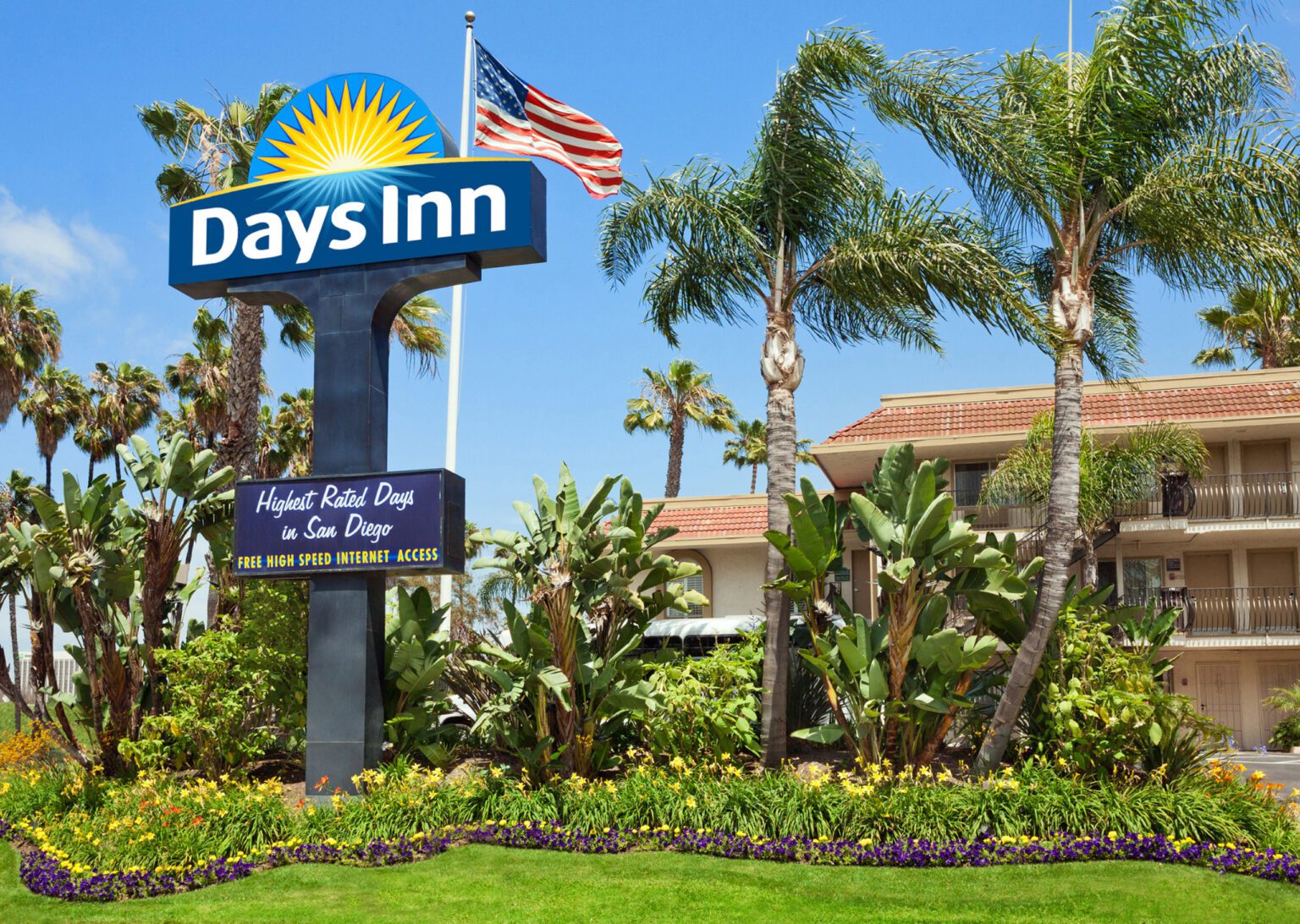 hotel exterior with palm trees