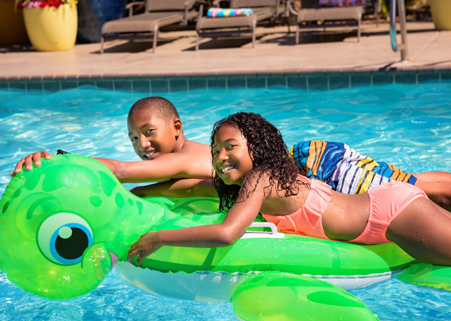 kids playing in the pool