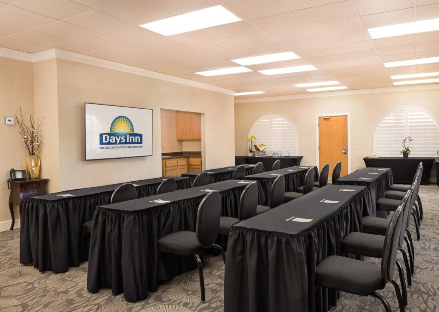 a meeting venue with tables and chairs