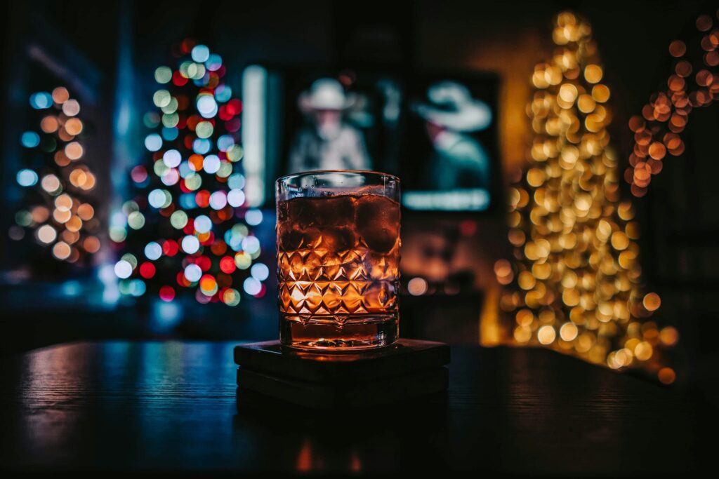 a drink with christmas lights