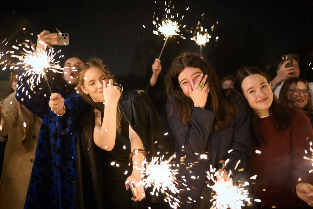 ladies with sparklers on new years eve
