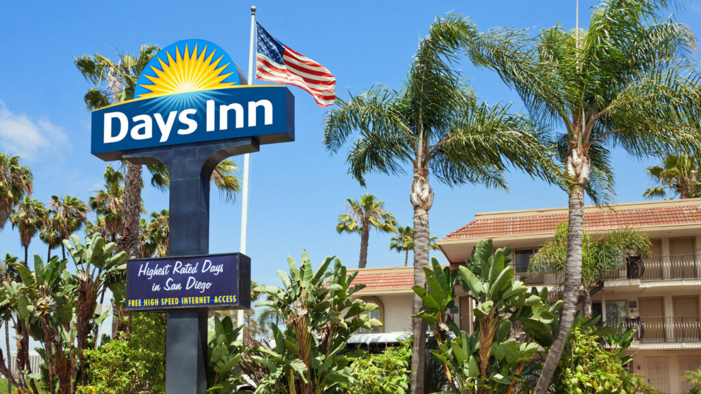 hotel exterior with palm trees