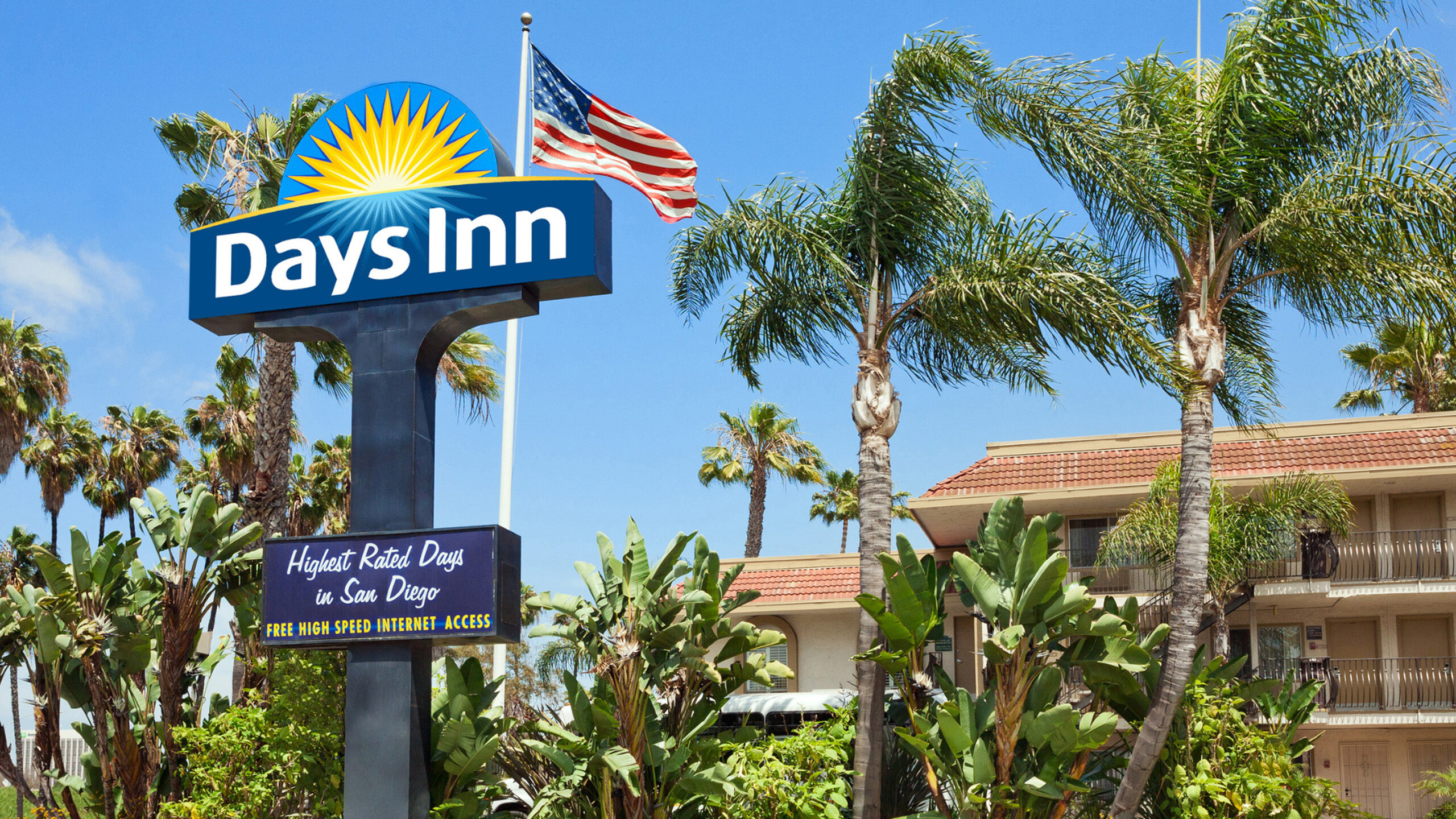 hotel exterior with palm trees