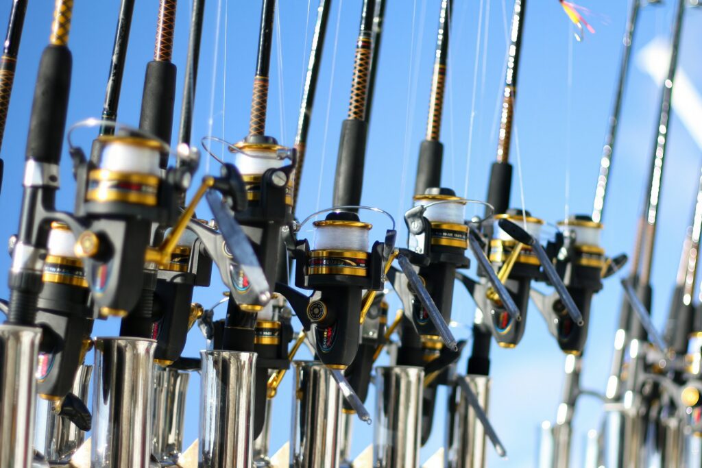 Fishing poles on a clear sky