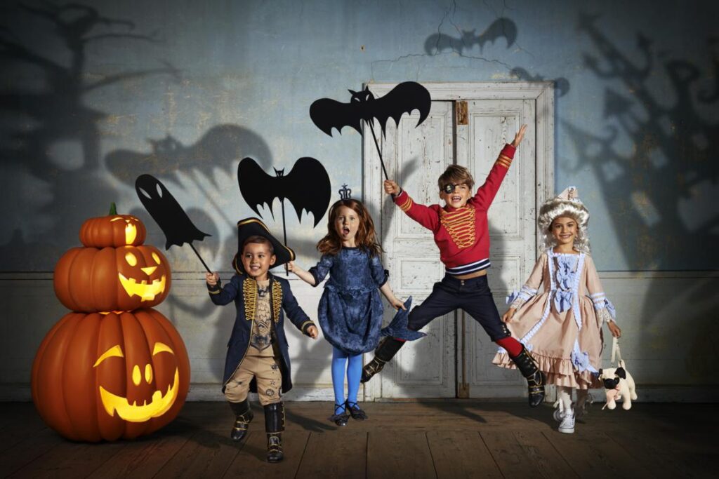 4 Kids in halloween costumes