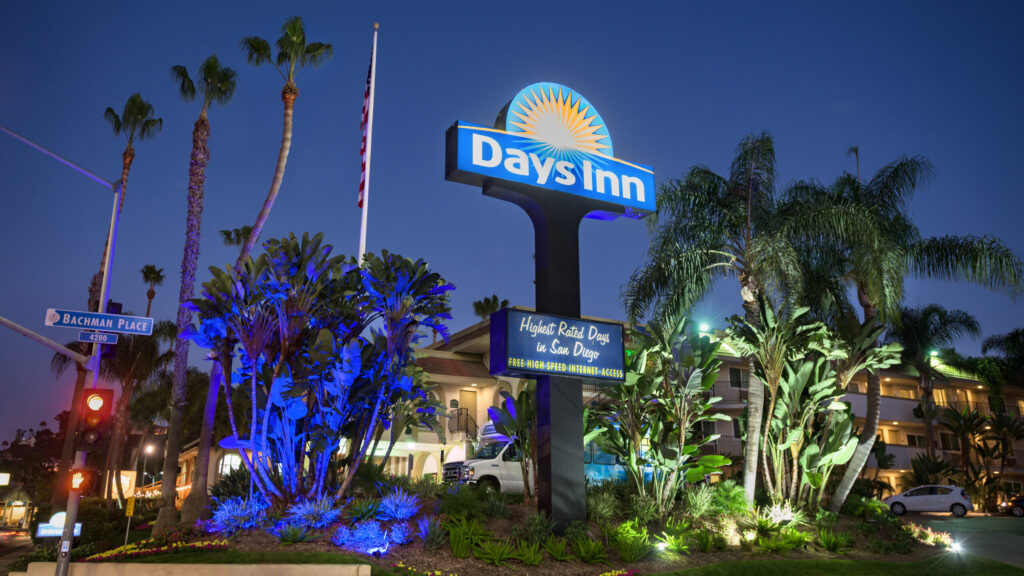 the hotel sign at night